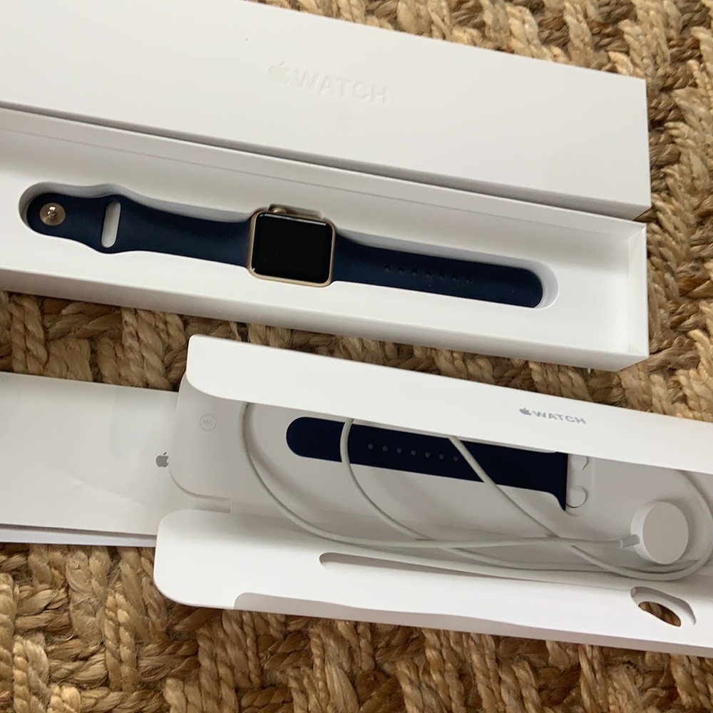 Apple Watch navy w gold . Maybe worn once!